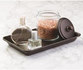 img 2 attached to mDesign Bronze Bathroom Vanity Countertop and Sink Accessory Set - Includes Glass Canister Jar, Toothbrush Holder, Soap Pump Dispenser, and Vanity Tray - Set of 4