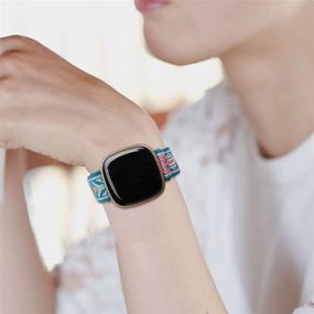 img 2 attached to 🌈 UHKZ набор из 4-х эластичных нейлоновых браслетов для Fitbit Versa 3/Sense, регулируемый эластичный спортивный браслет из ткани для женщин и мужчин, БохоРадуга/Зеленая стрела/Леопард/Бохо Грин, совместим с умными часами Fitbit Versa.