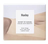 huxley secret of sahara cream antigravity: korean anti-aging facial cream with vitamin e, f, k & prickly pear cactus oil for improved skin elasticity logo
