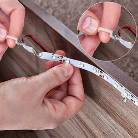 img 1 attached to 200-Pack Transparent LED Strip Light Clips with Screws - Mounting Brackets for 10mm Wide Non-Waterproof 3528 / 5050 LED Light Strips