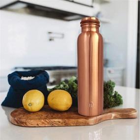 img 2 attached to 🧪 Pure Copper Water Bottle Ayurvedic - Leak Proof 1 Litre Copper Bottle for Yoga and Daily Use - Texas Neuman Copper Water Vessel - 34OZ Copper Bottle with Lid - Great for Health Benefits