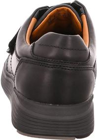 img 1 attached to Stylish and Comfortable: CLARKS Abode Strap Leather Men's Loafers & Slip-Ons