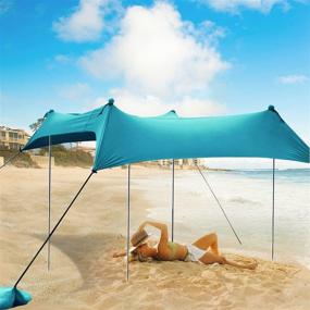 img 4 attached to 🏖️ OKL Family Beach Tent Canopy Pop Up Sunshade with 4 Aluminum Poles & Carrying Bag - Outdoors Beach Fishing Backyard Camping Picnics - UPF50 Sun Protection - Light Blue - 10X9 FT