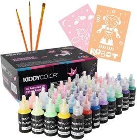 img 4 attached to 🎨 KIDDYCOLOR 40 Colors 3D Fabric Paint Kit - Fluorescent, Glow in The Dark, Glitter, Metallic - Ideal for Clothing, T-Shirt, Glass, Wood, Ceramic - Includes 3 Brushes and Stencils