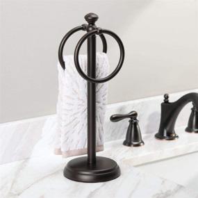 img 3 attached to mDesign Bronze Towel Rack Stand with 2 Hanging Rings for Bathroom Vanity Countertops - Space Saving Hand Towel Holder with Hyde Collection