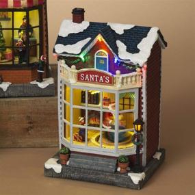 img 1 attached to Animated Lighted Christmas Village Shops Storefronts with Moving Scene - Santa's Workshop