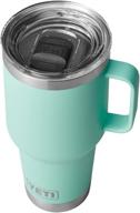 yeti rambler 30 oz travel mug: stainless steel, vacuum insulated with stronghold lid in seafoam - perfect for on-the-go! logo