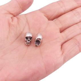 img 2 attached to 🎃 Halloween Crafts Jewelry Making Supplies: Bulk Antique Silver 4mm Hole Macroporous Skull Metal Spacer Beads - QTMY