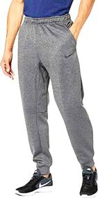 img 2 attached to Nike Therma Men's Dri-FIT Tapered Training Pants 👖 in Grey Heather (CV7739-063) - Advanced Performance and Comfort