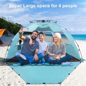 img 2 attached to 🏖️ XL Pop Up Beach Tent Sun Shelter by KOON - Easy Setup Beach Shade for 3-4 People with UPF 50+ Protection, Extended Floor, 3 Ventilation Windows, and Carrying Bag - Ocean Blue