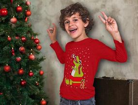 img 2 attached to 🦖 Roar into the Holidays with the T Rex Santa Christmas Sweater Sweatshirt for Boys