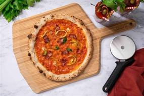 img 1 attached to 🍕 Premium Ooni 14” Bamboo Pizza Peel - Versatile Lightweight Pizza Paddle and Serving Board - Outdoor Oven Accessories you need