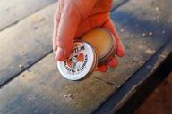 🤠 blazing saddles solid cologne - seductive leather, gunpowder, and sandalwood fragrance in a pocket-sized tin - 1 oz. - unisex scent - embrace your inner outlaw! logo