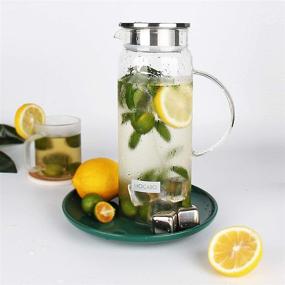 img 2 attached to 🥤 SIXAQUAE 48OZ Pitcher Glass Water Pot with Stainless Steel Lid - Perfect for Juice, Ice Tea, and More!