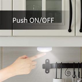 img 3 attached to GE Mini Touch Light 4-Pack: Battery Operated LED Lights with On/Off Push Button for Closets, Cabinets, and Garage - White, 4 Piece Set