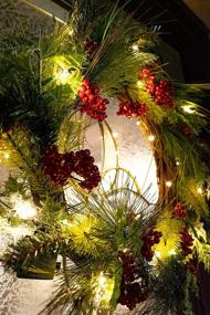 img 1 attached to 🎄 22-Inch Lighted Christmas Wreath with Evergreen, Red Berries, and Timer - Battery-Operated LED Lights