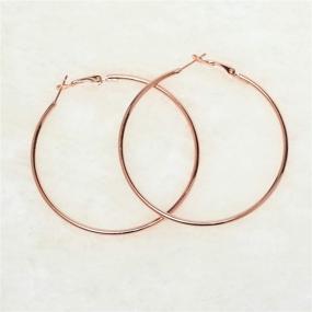 img 1 attached to 🎁 N&T Stainless Steel Hypoallergenic Huggie Hoop Loop Earrings- Christmas Gift Set for Women and Girls