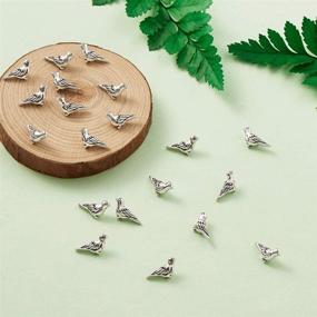 img 1 attached to 🕊️ Fashewelry 50Pcs Tibetan Metal Bird Charm Beads, Antique Silver Spacer Beads 7x14mm with 1mm Hole, Ideal for Jewelry Making