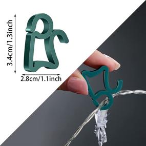 img 3 attached to 🎄 Enhance Your Holiday Decor with JOVITEC Christmas Light Clips – Easy Gutter Hang Hooks for Outdoor String Lights (Green, 100 Pieces)