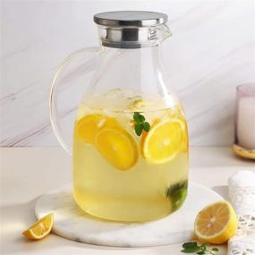 img 3 attached to 🥤 Premium 85 Ounces Glass Pitcher with Filter Lid - For Homemade Juice & Iced Tea - Stovetop Safe Carafe Jug