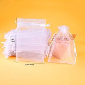 img 1 attached to 🛍️ Medium Organza Bags Jewelry Pouches with Drawstring Closure - 60 PCS Sheer Mesh Candy Favour Bags for Wedding, Party, Christmas, Festival Game, Gift Bags - White, 10 x 15CM