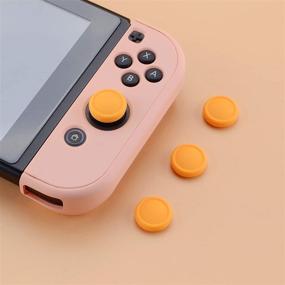 img 1 attached to eXtremeRate PlayVital Switch Joystick Caps - Enhance Grip & Precision Control for Nintendo Switch & Switch Lite - Caution Yellow