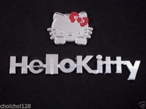 img 1 attached to 🚗 Новый плоский автомобильный значок Hello Morning Kitty Kitten с хромированным серебряным отливом и красной ленточкой - на переднюю или заднюю сторону автомобиля - 1 шт.