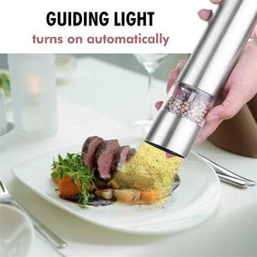 img 2 attached to 🧂 Impressive Stainless Steel iTouchless Automatic Electric Salt and Pepper Grinder Set with Adjustable Coarseness and LED Light – Battery Operated – 1 Set (2 Count)