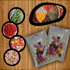 img 1 attached to 🌈 100 Reusable Holographic Ziplock Bags for Smell Proof Packaging - Resealable Flat Bags (3x4 Inches) - Ideal for Food, Candy, Storage, Lip Gloss, and More! Vibrant Rainbow Color with 10 Bonus Black Mylar Bags