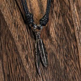 img 1 attached to BlueRica Two Feather Pendants - Antique Silver Necklace on Adjustable Black Rope Cord