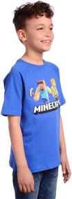 img 1 attached to 🕹️ Stylish Minecraft Boys' Steve and Alex on The Go Graphics Short Sleeve T-Shirt - Perfect for Gaming Enthusiasts