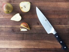 img 2 attached to 🔪 ZWILLING J.A. Henckels 38401-183 Chef's Knife, 7", Black/Stainless Steel: Superior Performance and Durability for Every Kitchen Task