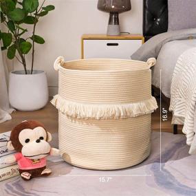 img 1 attached to 🧺 YOUDENOVA Large Woven Rope Storage Basket: Decorative Beige Hamper with Cute Knot Handles, Perfect for Toy, Clothes, and Blanket Organization. Boho Laundry Hamper for Living Room or Baby Nursery, 15.7x16.9 Inches.