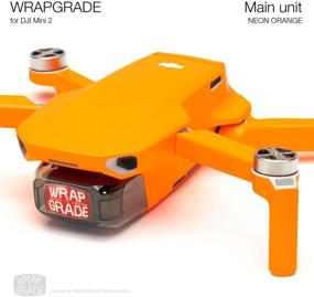 img 2 attached to 🧡 SEO Optimized Wrapgrade Skin for DJI Mini 2 (NEON Orange) - Main Unit