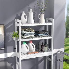 img 1 attached to Bamboo Over-The-Toilet Storage Rack: 3-Tier Space Saver Organizer with Anti-Tilt Design and 3 Hooks for Laundry, Balcony, Porch - White
