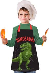 img 3 attached to 👩 Kids Apron Aprons for Kids: Perfect Christmas Gift for Girls and Boys for Cooking, Baking, Painting, Gardening and School Activities - Adjustable Neck Strap, Pockets Included (Black+Dinosaur, 6-12 Years)