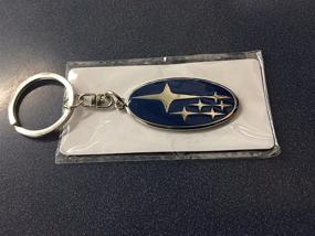 img 1 attached to 🔑 Premium Subaru Gear Logo Oval Key Tag Keyring: Genuine Quality Key Chain