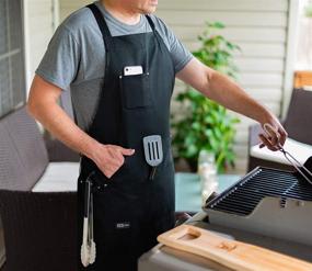 img 2 attached to Versatile Professional Chef Apron for Men and Women - Cooking, Kitchen, BBQ Grill Accessory with Large Tool Pockets, Adjustable Size, Cotton Black Fabric, Quick Release Buckle, Dual Side Loops