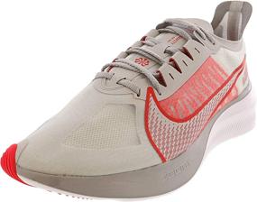 img 1 attached to Nike Gravity Running Sneakers Metallic Sports & Fitness