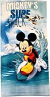 surf shack towel for boys featuring mickey mouse's surfing adventure logo