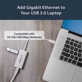 img 1 attached to 🔌 StarTech.com USB 3.0 to Gigabit Ethernet Adapter NIC with USB Port (White) - USB 3.0 NIC - High-Speed USB 3.0 LAN Adapter for 10/100/1000 Mbps Connectivity (USB31000SPTW)