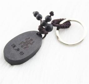 img 1 attached to 🐏 FOY-MALL Chinese Zodiac Sheep Ebony Wood Carved Unisex Key Chain M1111