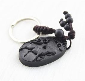 img 2 attached to 🐏 FOY-MALL Chinese Zodiac Sheep Ebony Wood Carved Unisex Key Chain M1111