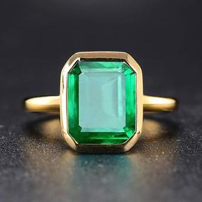 img 1 attached to 💍 RIZILIA Solitaire Engagement Ring: Emerald Cut CZ Gemstones in 18K Yellow Gold Plated - Simulated Green Emerald, Simple Modern Elegance