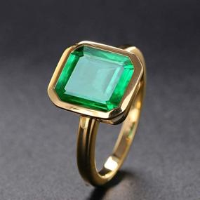 img 2 attached to 💍 RIZILIA Solitaire Engagement Ring: Emerald Cut CZ Gemstones in 18K Yellow Gold Plated - Simulated Green Emerald, Simple Modern Elegance
