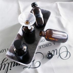 img 2 attached to BPFY 12 Pack 4 oz Amber Boston Glass Bottle with Black Poly Cap: Ultimate Kit for Homemade Vanilla Extract, Essential Oils & Herbal Medicine - Perfect Wedding, Christmas & Holiday Gift (Amber)