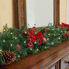 img 2 attached to OasisCraft 9FT 12Inch Prelit Christmas Garland: Battery Operated and Timer Lights, Indoor/Outdoor Greenery Xmas Decor with Bowknots
