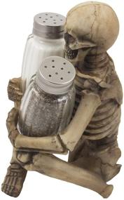 img 3 attached to Gothic Gifts: Spooky Skeleton Glass Salt and Pepper Shaker Set with Decorative Spice Rack Display Stand Holder Figurine - Perfect for Spooky Halloween Party Decorations and Skulls & Skeletons Kitchen Décor