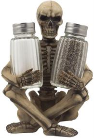 img 4 attached to Gothic Gifts: Spooky Skeleton Glass Salt and Pepper Shaker Set with Decorative Spice Rack Display Stand Holder Figurine - Perfect for Spooky Halloween Party Decorations and Skulls & Skeletons Kitchen Décor