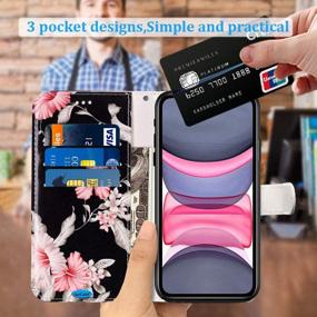 img 2 attached to JanCalm iPhone 11 Wallet Case: Floral Pattern PU Leather with Wrist Strap, Card/Cash Slots, Stand Feature and Flip Cover – Black/Flower